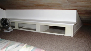 Storage to west of bed